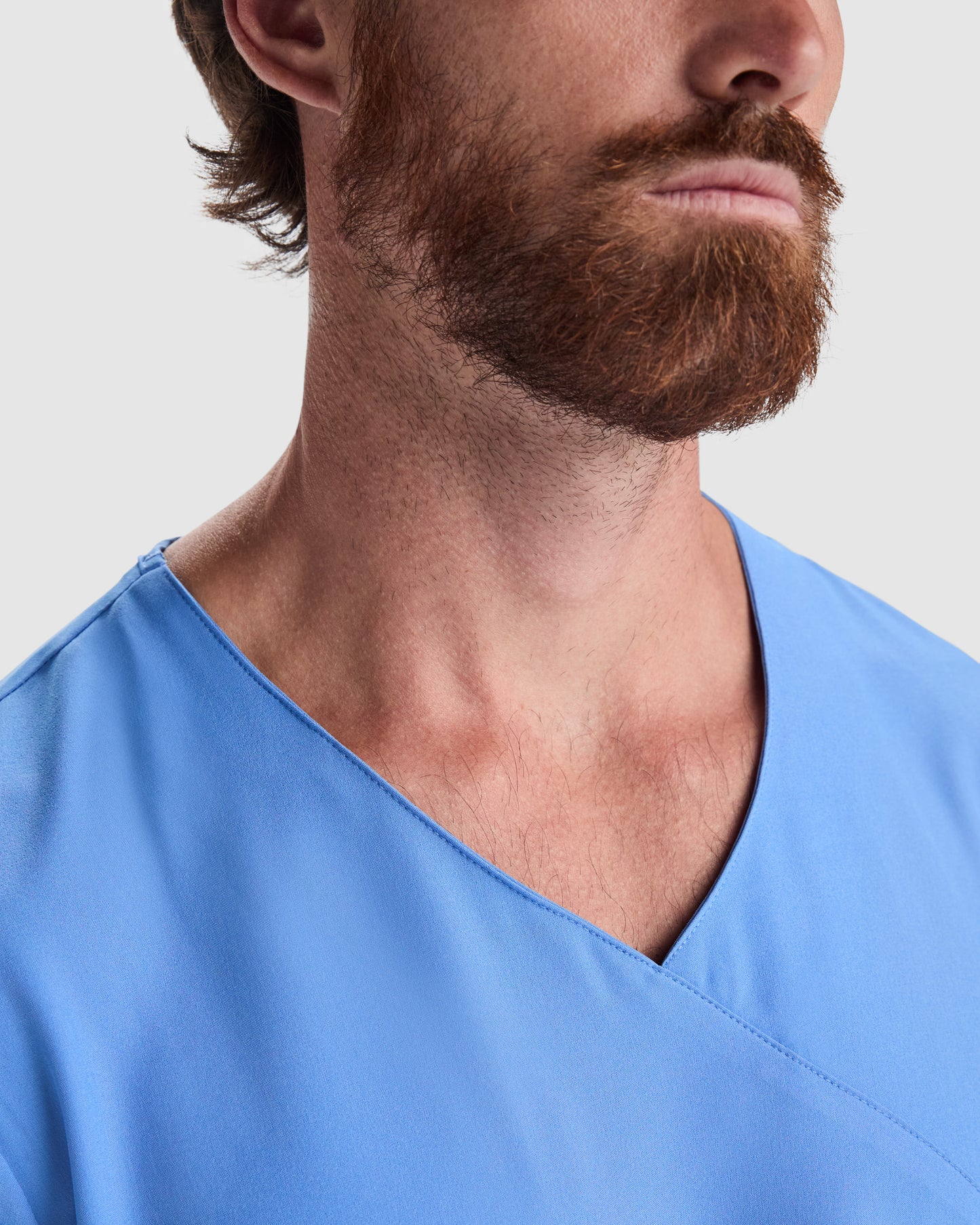 Itin patogus ir kokybiškas Unisex švarkelis FEROX, skirtas darbui medicinos sektoriuje (įvairių spalvų)