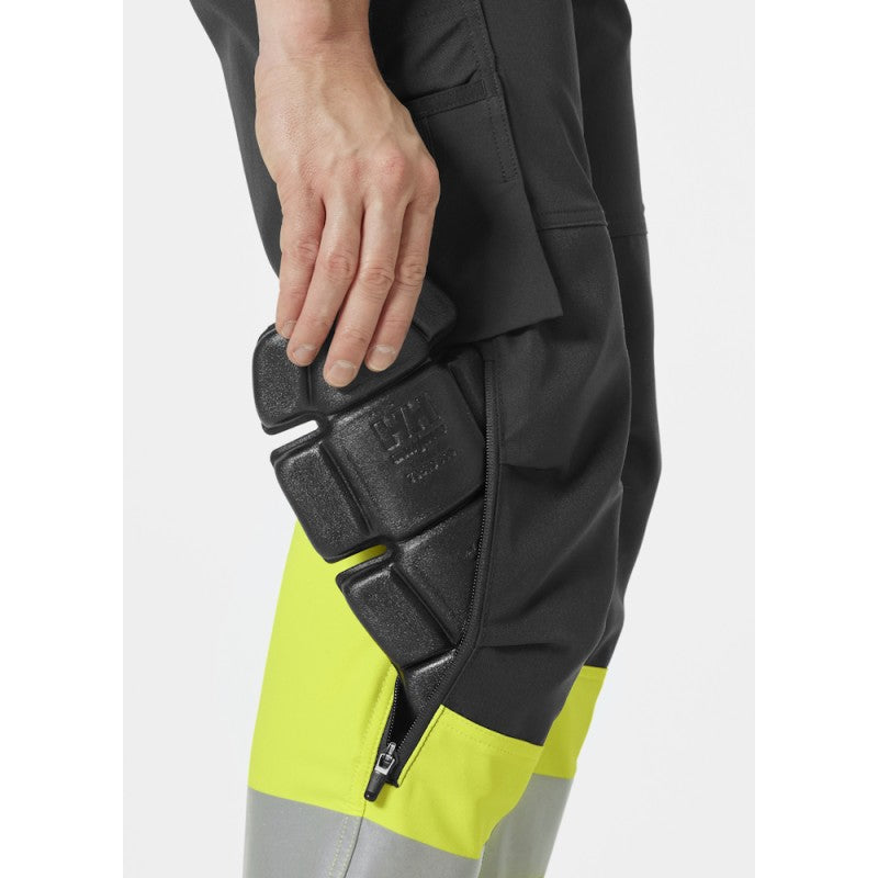 Elastingos kelnės su šviesą atspindinčiais elementais HELLY HANSEN Alna 4X CL 1, geltonos