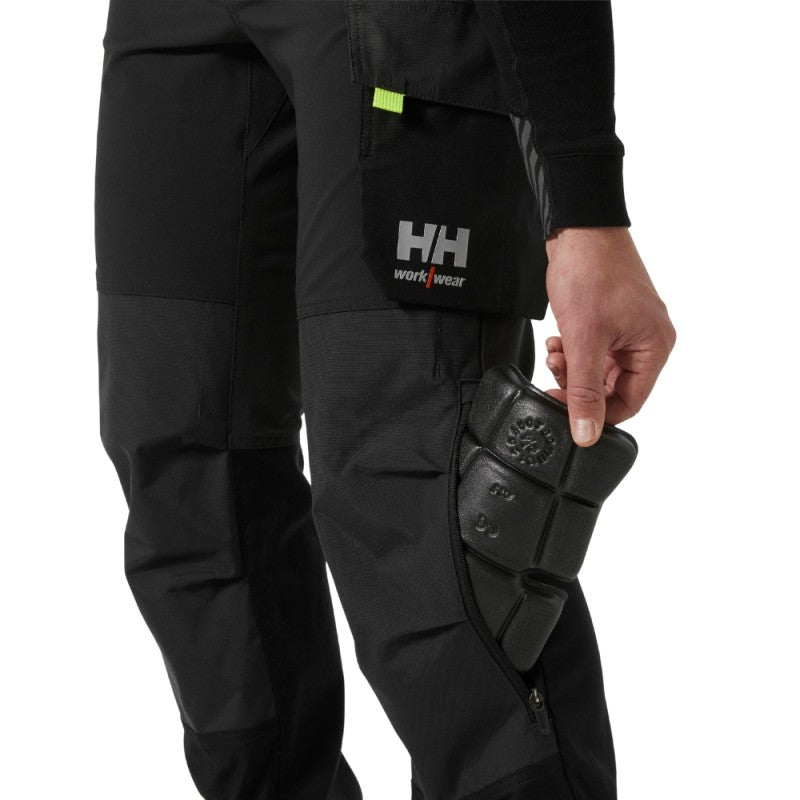 Puskombinezonis HELLY HANSEN Oxford 4X Cnct Bib, juodas