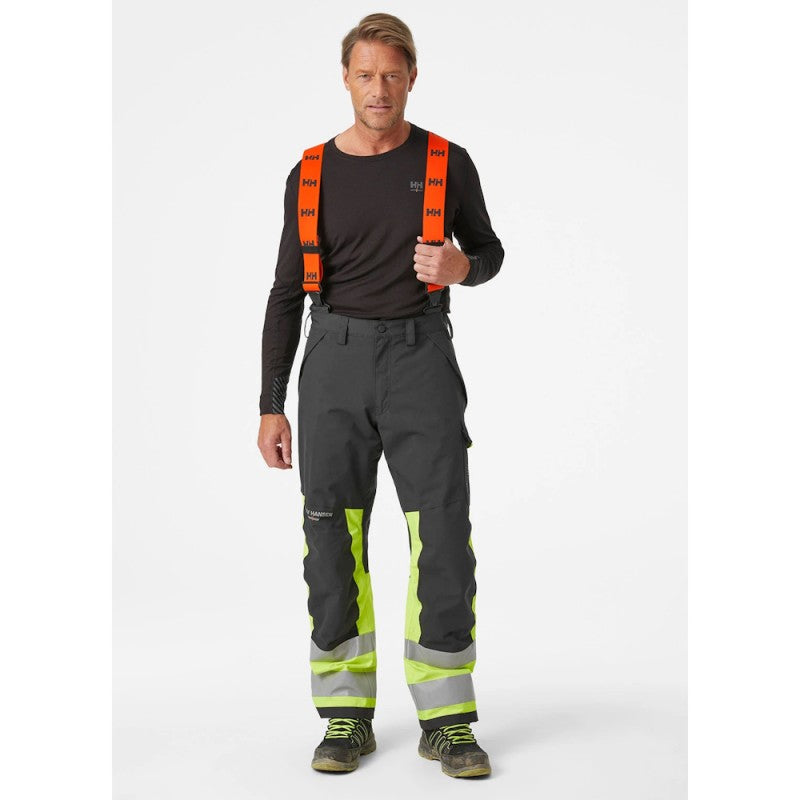 Žieminės šviesą atspindinčios kelnės Helly Hansen Alna 2.0 WINTER PANTS CL 1, juodos/geltonos
