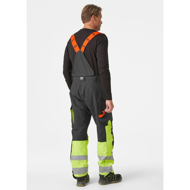 Žieminės šviesą atspindinčios kelnės Helly Hansen Alna 2.0 WINTER PANTS CL 1, juodos/geltonos